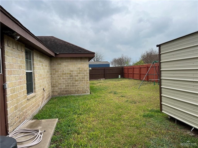 view of yard featuring a fenced backyard