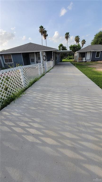 view of front of home with a carport