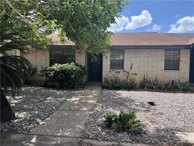 2704 Ashley Ct, Pharr, TX 78577 - view of front of home featuring brick siding and a shingled roof