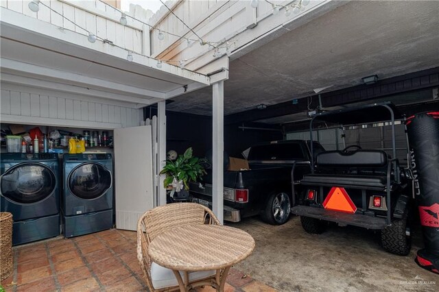 garage featuring independent washer and dryer