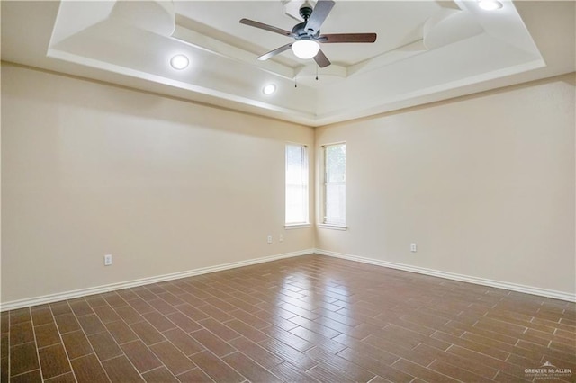 2320 Pelican Ave, Mcallen, TX 78504 - unfurnished room featuring a raised ceiling, a ceiling fan, recessed lighting, and baseboards