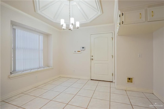 2320 Pelican Ave, Mcallen, TX 78504 - unfurnished dining area with a chandelier, ornamental molding, baseboards, and light tile patterned floors