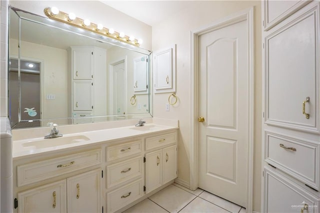 2320 Pelican Ave, Mcallen, TX 78504 - bathroom featuring double vanity and tile patterned flooring