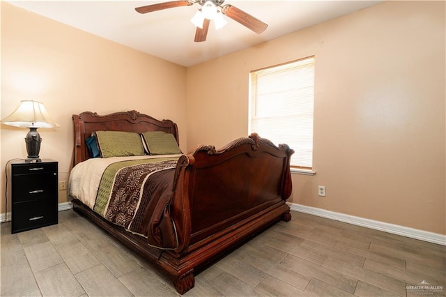 520 W Upas Ave, Mcallen, TX 78501 - bedroom with light wood-type flooring, baseboards, and a ceiling fan