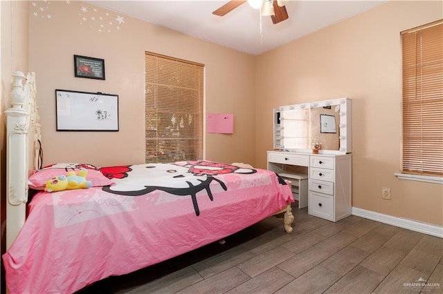 520 W Upas Ave, Mcallen, TX 78501 - bedroom with dark wood-type flooring, ceiling fan, and baseboards