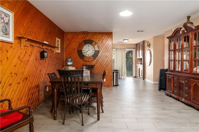 520 W Upas Ave, Mcallen, TX 78501 - dining space featuring wooden walls and baseboards