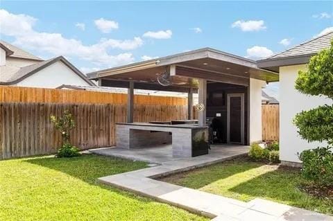 view of yard with a patio area and a fenced backyard