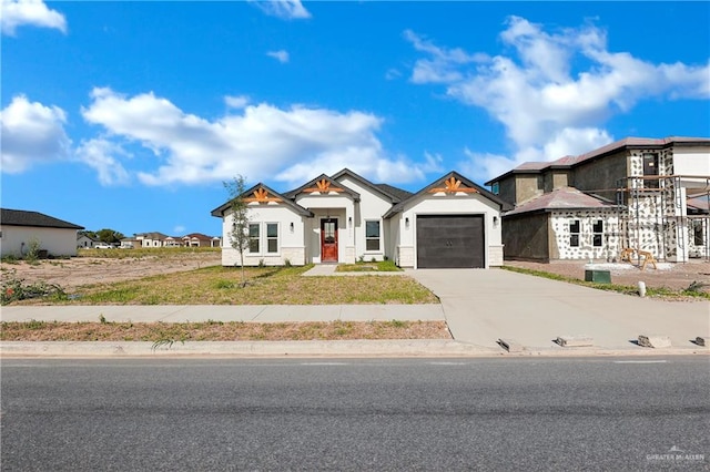 view of front of home with a garage