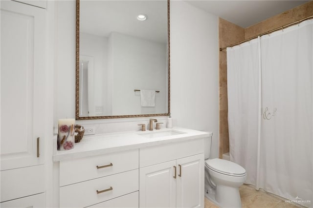 bathroom featuring tile patterned floors, walk in shower, vanity, and toilet