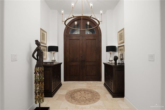 entryway with a high ceiling