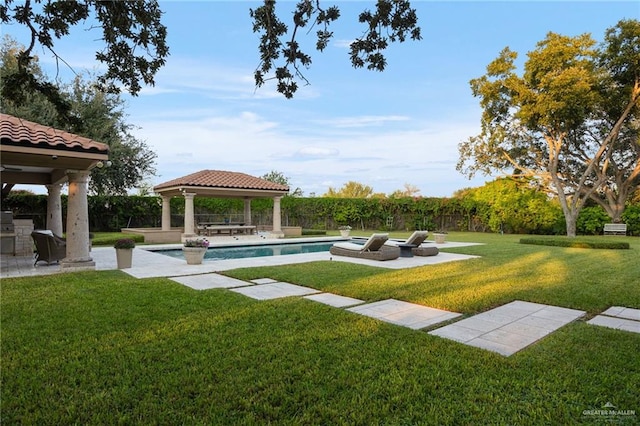 view of pool featuring a gazebo, a patio area, and a yard