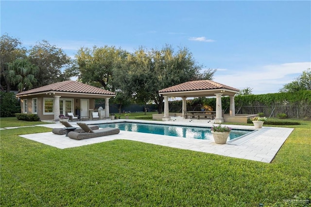 view of pool with a gazebo, a yard, and a patio