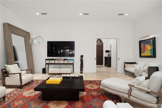 living room with ornamental molding