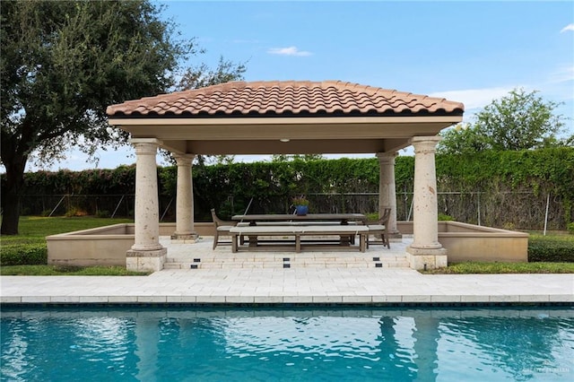 view of pool with a gazebo and a patio