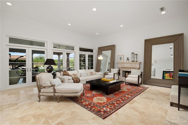 living room featuring french doors and ornamental molding