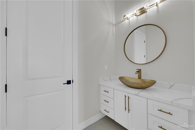 bathroom with vanity and tile patterned flooring