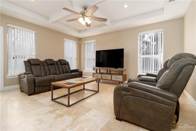 living room with plenty of natural light, ceiling fan, baseboards, and recessed lighting