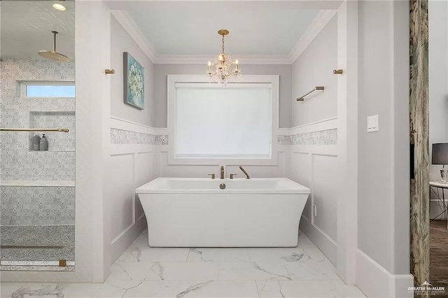 bathroom with ornamental molding, marble finish floor, wainscoting, and a decorative wall