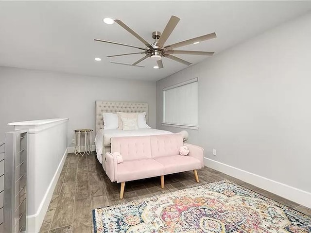 bedroom with recessed lighting, wood finished floors, a ceiling fan, and baseboards