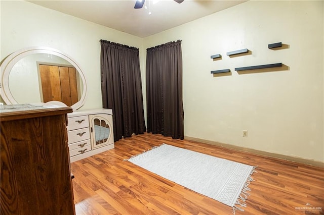 2401 E Austin Ave, Harlingen, TX 78550 - bedroom featuring wood finished floors and ceiling fan