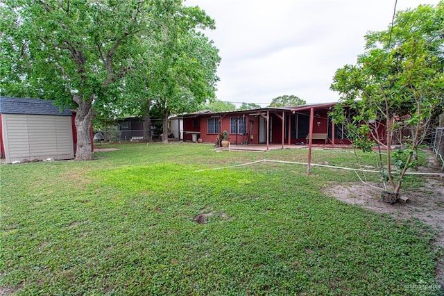 2401 E Austin Ave, Harlingen, TX 78550 - view of yard featuring a shed and a patio area