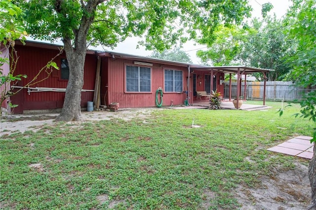 2401 E Austin Ave, Harlingen, TX 78550 - rear view of house with a patio area