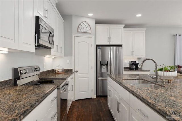 5313 N Crown Pt, Pharr, TX 78577 - kitchen featuring a sink, dark wood-style flooring, appliances with stainless steel finishes, recessed lighting, and white cabinetry