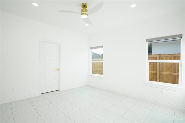 unfurnished room featuring ceiling fan