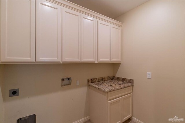 2014 Thacker Ln, Harlingen, TX 78552 - laundry area featuring cabinet space, hookup for an electric dryer, and hookup for a washing machine