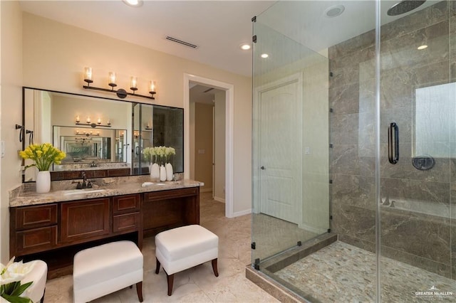 2014 Thacker Ln, Harlingen, TX 78552 - full bath with a stall shower, vanity, and recessed lighting