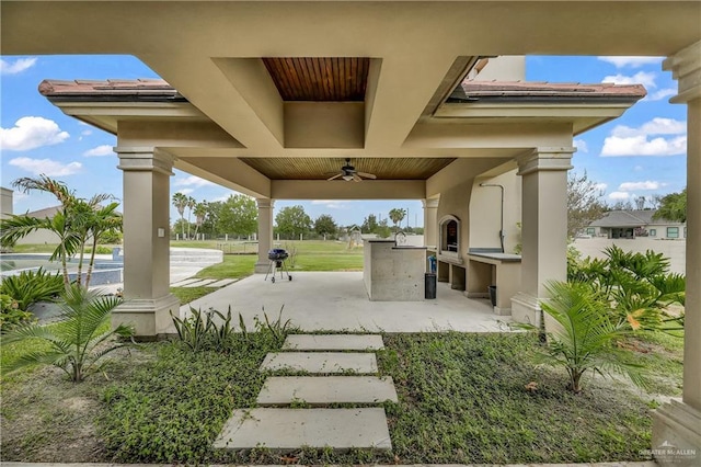 view of patio / terrace featuring ceiling fan and area for grilling