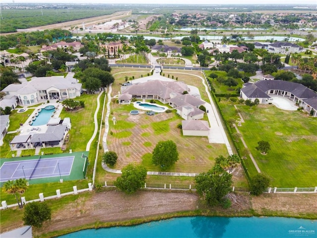 bird's eye view with a water view and a residential view