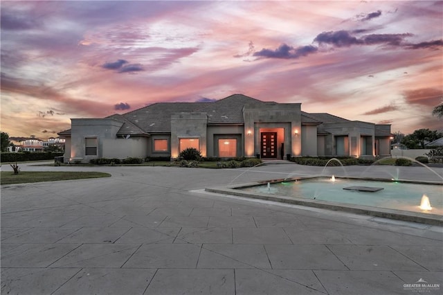 exterior space with stucco siding