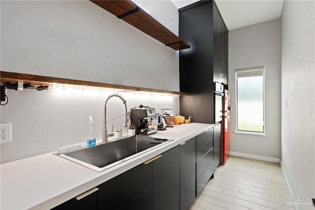 kitchen featuring sink and light hardwood / wood-style floors