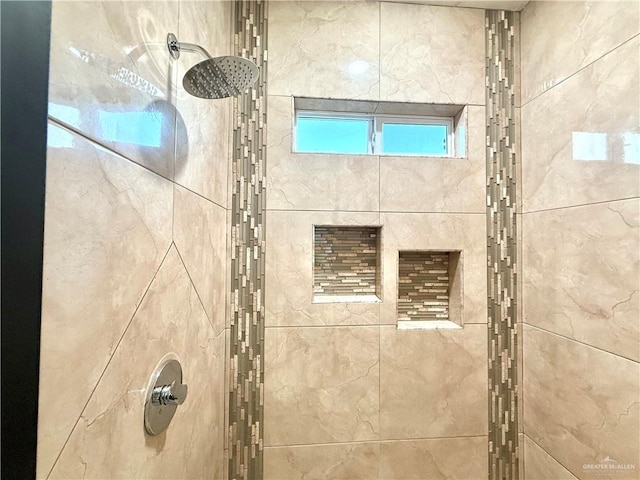 details with a tile shower