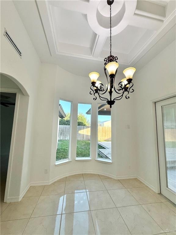 interior space with a chandelier, visible vents, coffered ceiling, and light tile patterned floors