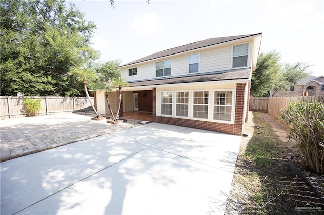 back of house featuring a patio