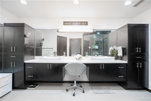 full bathroom featuring double vanity, recessed lighting, and a shower with shower door