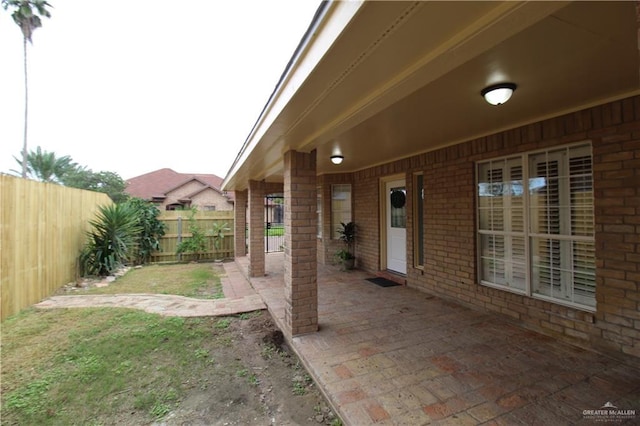 2115 Ichabod Ln, Edinburg, TX 78539 - fenced backyard with a patio area