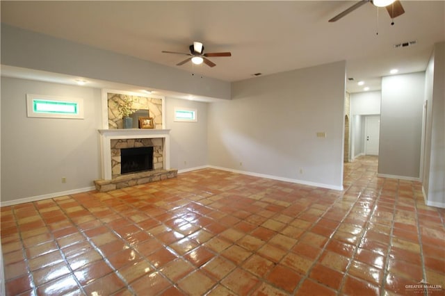 2115 Ichabod Ln, Edinburg, TX 78539 - unfurnished living room with ceiling fan, a fireplace, tile patterned flooring, and recessed lighting