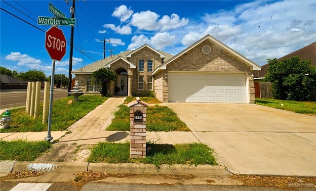 view of front of home with a garage