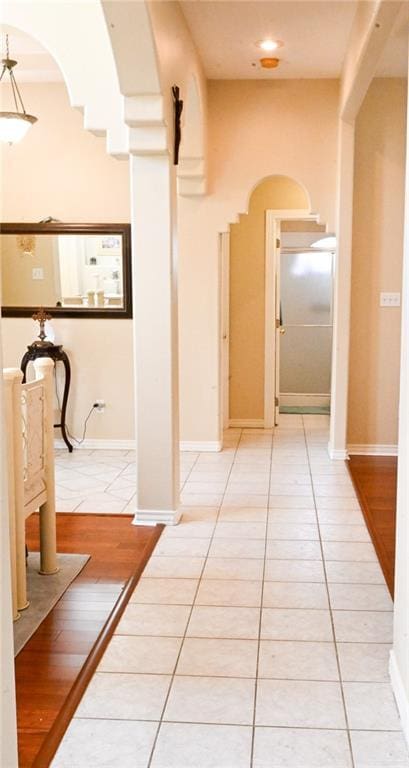 hallway with light tile patterned flooring