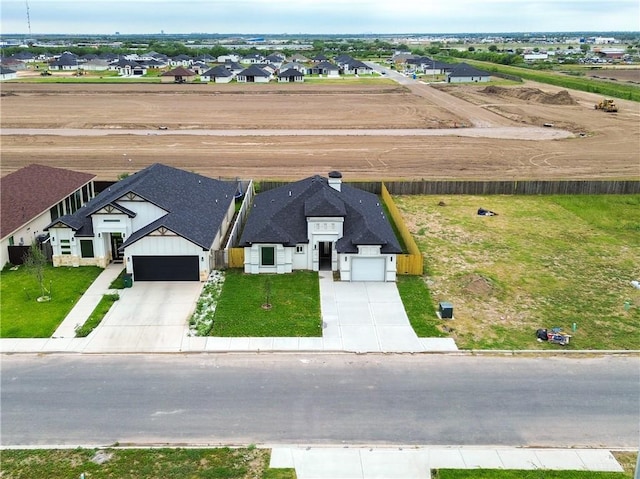 drone / aerial view featuring a residential view