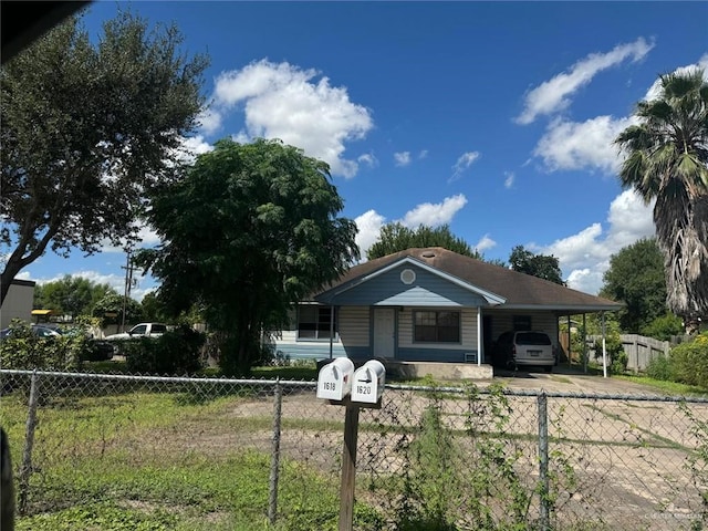 single story home featuring a carport