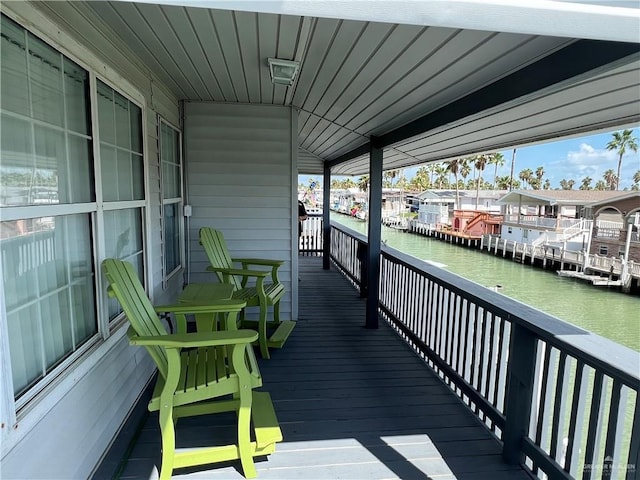 deck featuring a water view