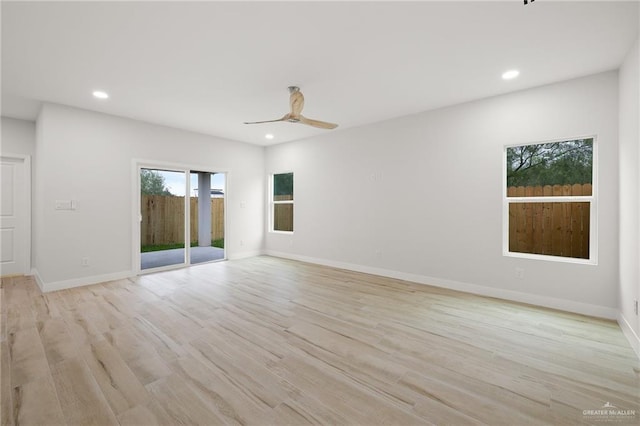 2615 E Solar Dr, Mission, TX 78574 - spare room featuring light wood-type flooring, ceiling fan, and recessed lighting
