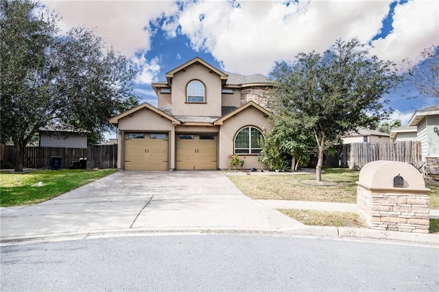 front of property featuring a garage and a front lawn