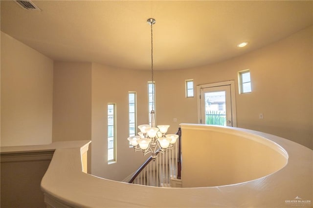 interior space with a chandelier