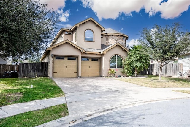 view of front facade with a yard and a garage