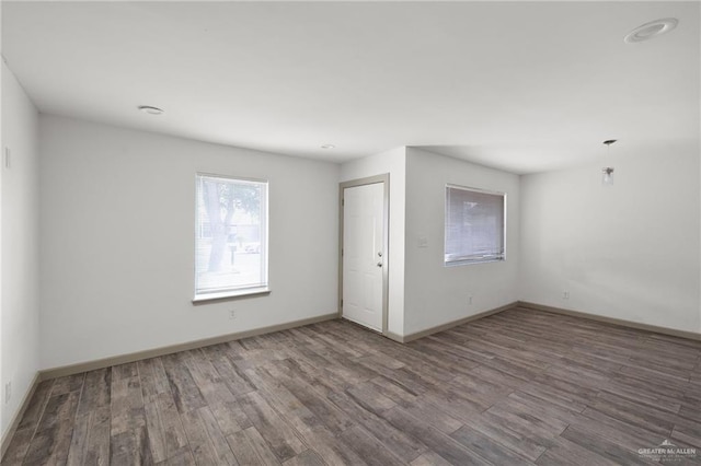 2120 Grambling Ave, Mcallen, TX 78504 - spare room featuring wood finished floors and baseboards